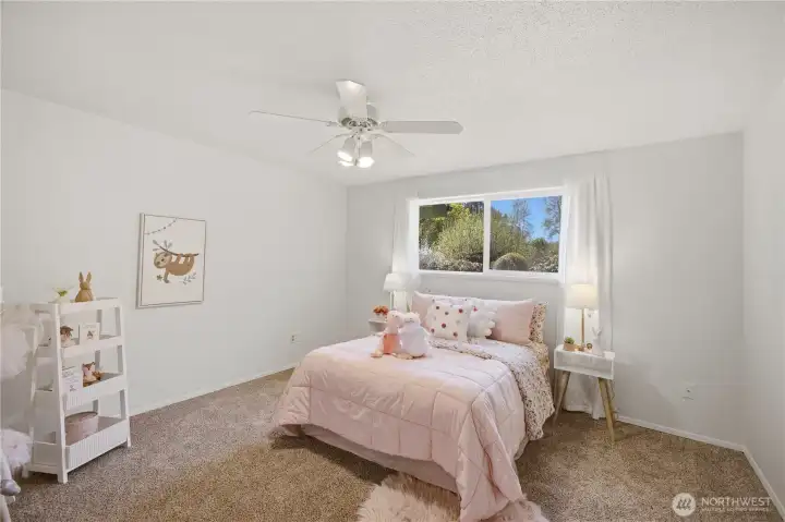 Shown here is the third bedroom, staged as a child's bedroom.