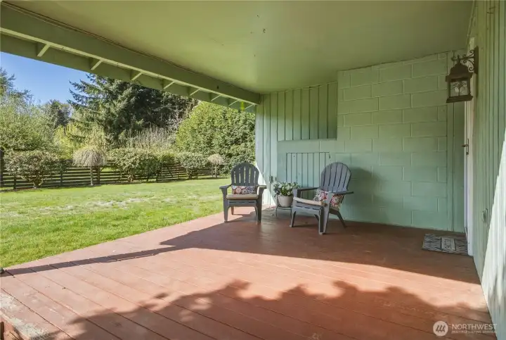 This covered deck invites you to bring your favorite patio chair and relax any time of the year.