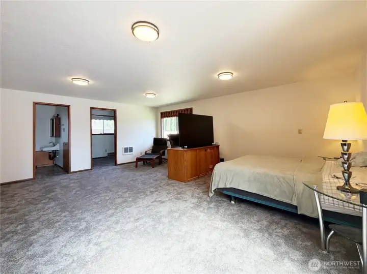 3/4 bath and walk-in closet in the background