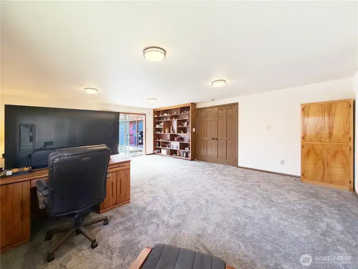 This room can be used however you want. Currently used as the primary bedroom and office.