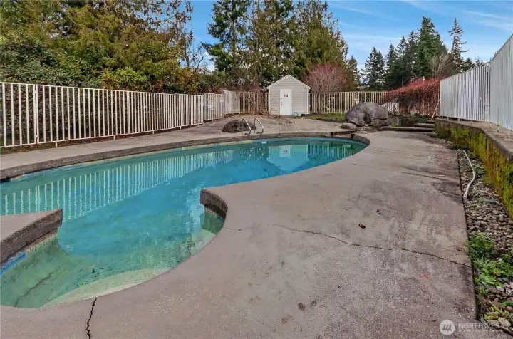 In-Ground Concrete Fenced Pool With Pool/Well House