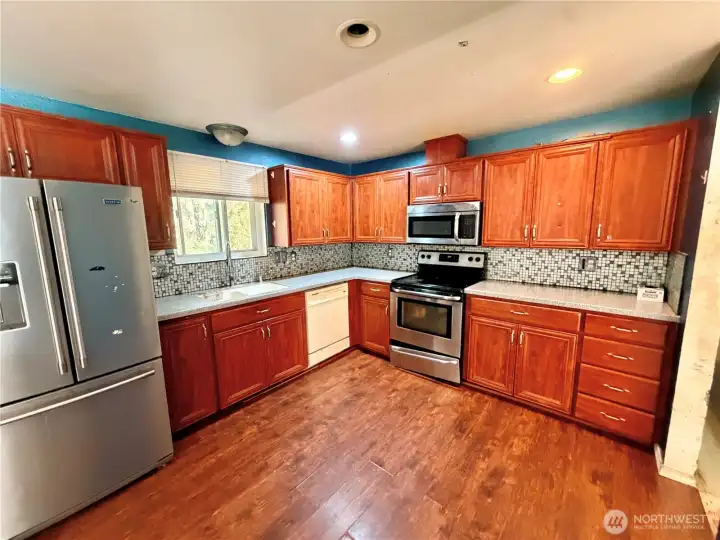 All stainless steel appliances to stay.