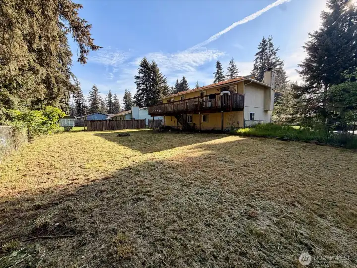 Large fully fenced lot.