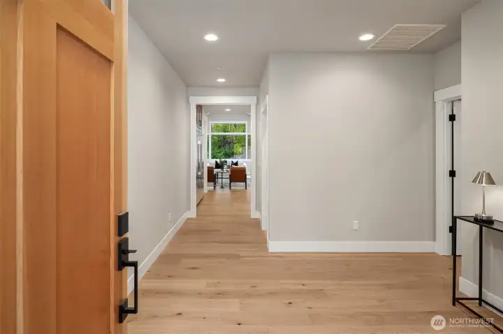 Step into this beautiful luxury home featuring expansive oak hardwood floors and recessed lighting throughout.
