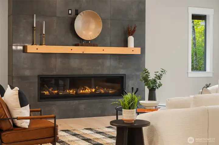 Cozy fireplace anchors the spacious great room.