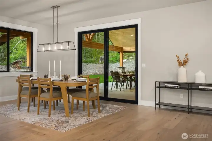 Expansive living and dining spaces are filled with natural light and thoughtfully designed for both everyday comfort and entertaining.
