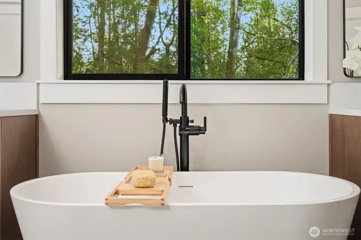 Relax and unwind in the spa-inspired soaking tub.