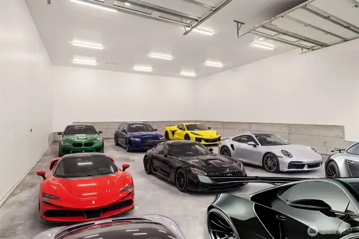 Interior of the detached shop. Photo enhanced with cars.