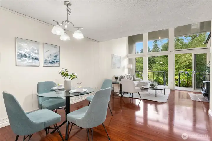 A lovely space to enjoy a meal, this dining area is situated between the kitchen and living room. A lovely space to enjoy a meal, this dining area is situated between the kitchen and living room.