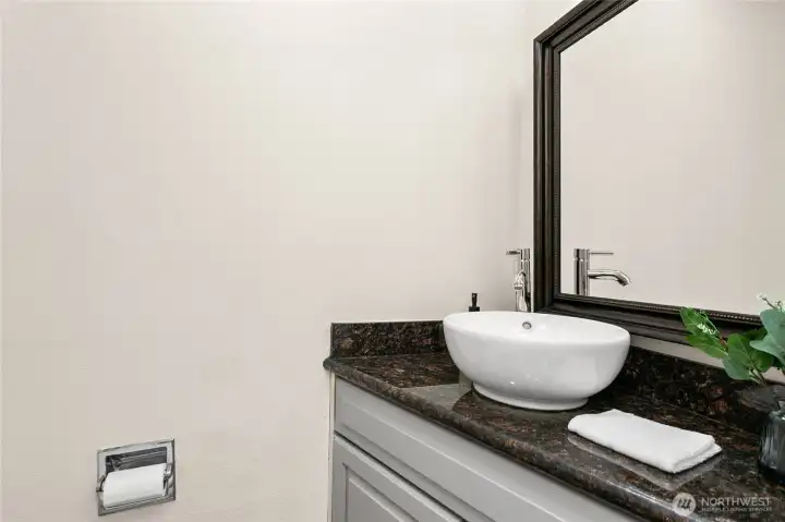 Half bath on the main floor. Half bath on the main floor.