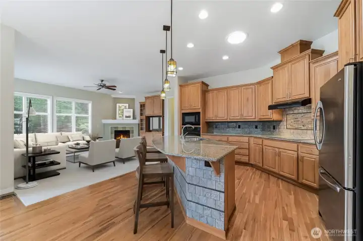 Family room and kitchen, virtually staged.