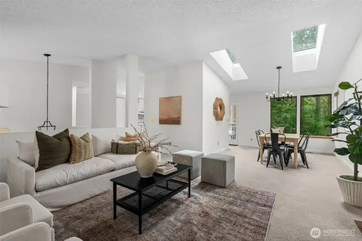 Skylights and dining room open to living room