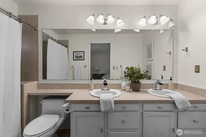 Beautiful tiled primary bathroom