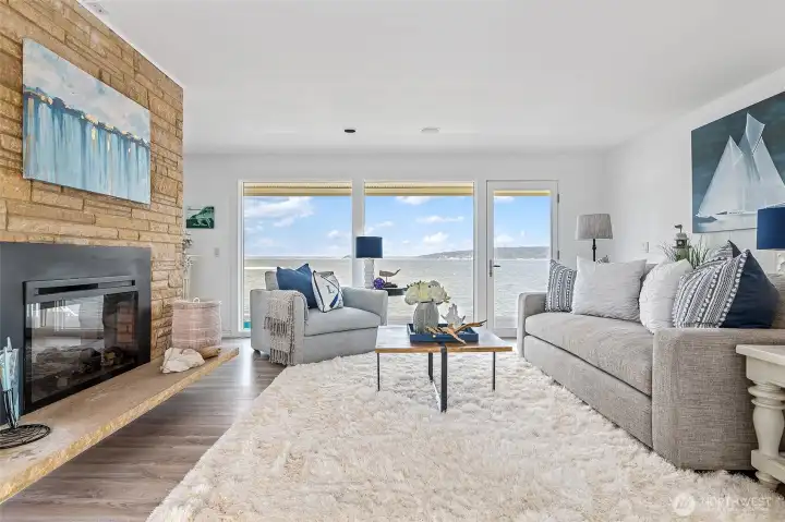 Wood burning fireplace with electric insert. Gas at street or remove electric insert and keep wood burning.