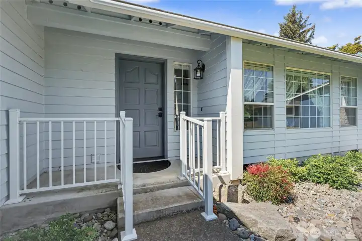 Front porch view, newer railing, so welcoming and inviting!