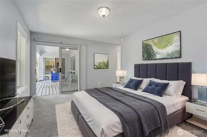 Primary bedroom view, large patio doors leading to your deck, plenty of space! ***Virtually Staged***