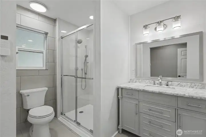 Primary ensuite 3/4 bath, completely updated, love the granite, shower and generous tile again.