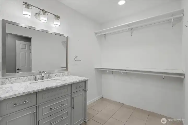 Primary ensuite bath view two showing large attached closet space. You can get fully ready in here while your partner sleeps in!