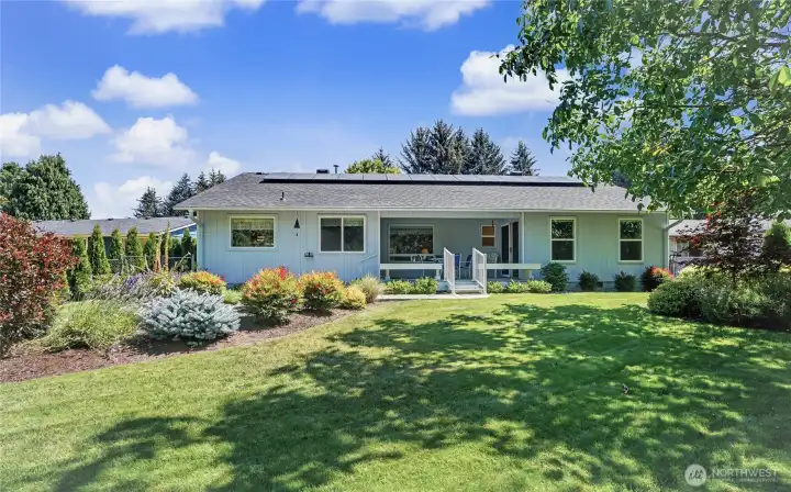 Rear view of your home from the edge of the back yard, welcome home!