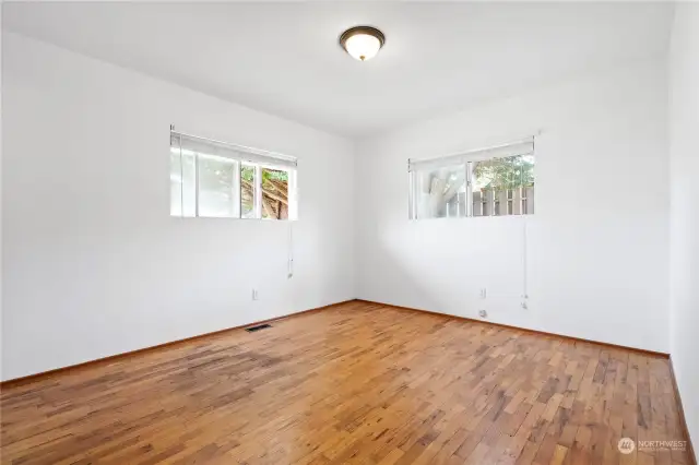 Primary Bedroom on Northwest corner of the home that includes an en-suite bathroom.