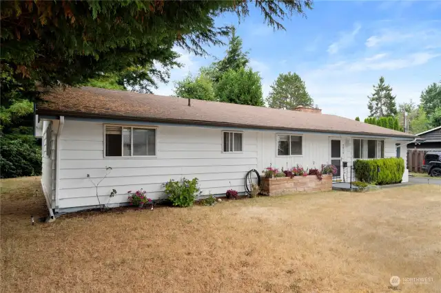 Home is partially fenced. A few fenced panels on the side will create a fully fenced back yard for your furry family members.