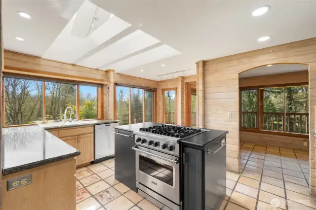 Surrounded by windows and flooded with natural light, this kitchen already has the views and the layout—just waiting for a light refresh to become something truly spectacular. A few thoughtful updates could take it from charming to showstopping.
