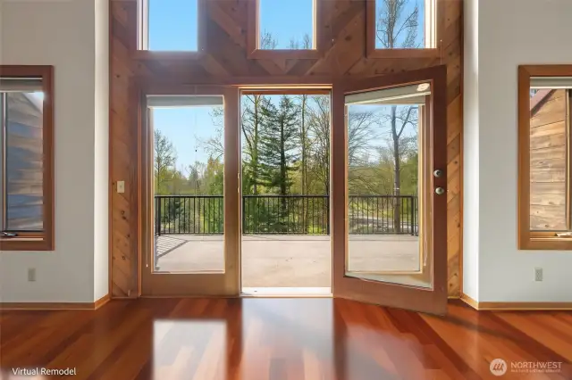 Nature takes center stage through these beautiful French doors, opening to a tree-lined view and spacious deck. Virtually remodeled to inspire, this moment captures the peace and possibility of indoor-outdoor living.