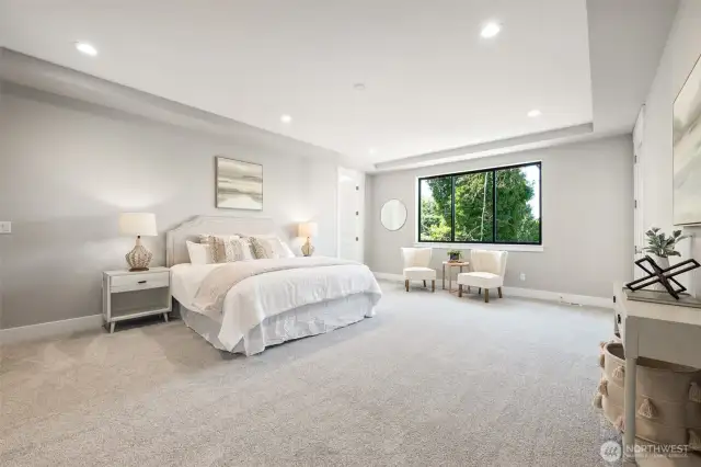 The primary suite is a dreamy sanctuary of peace and space.