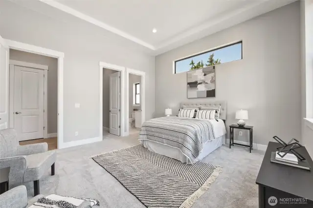 Stunning enough to be the primary suite, but this is a secondary guest suite, also on the main level.