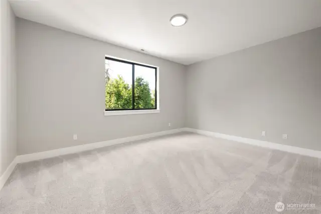 One of two extra bedrooms on the lower level.