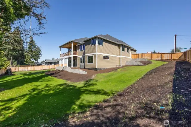 With over 1/2 acres of property, there is more than enough room for play, pets, privacy, gardening, and even space for a detached garage/shop.