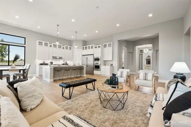 Elegant, yet comfortable, the living room effortlessly transitions into the kitchen and dining room.