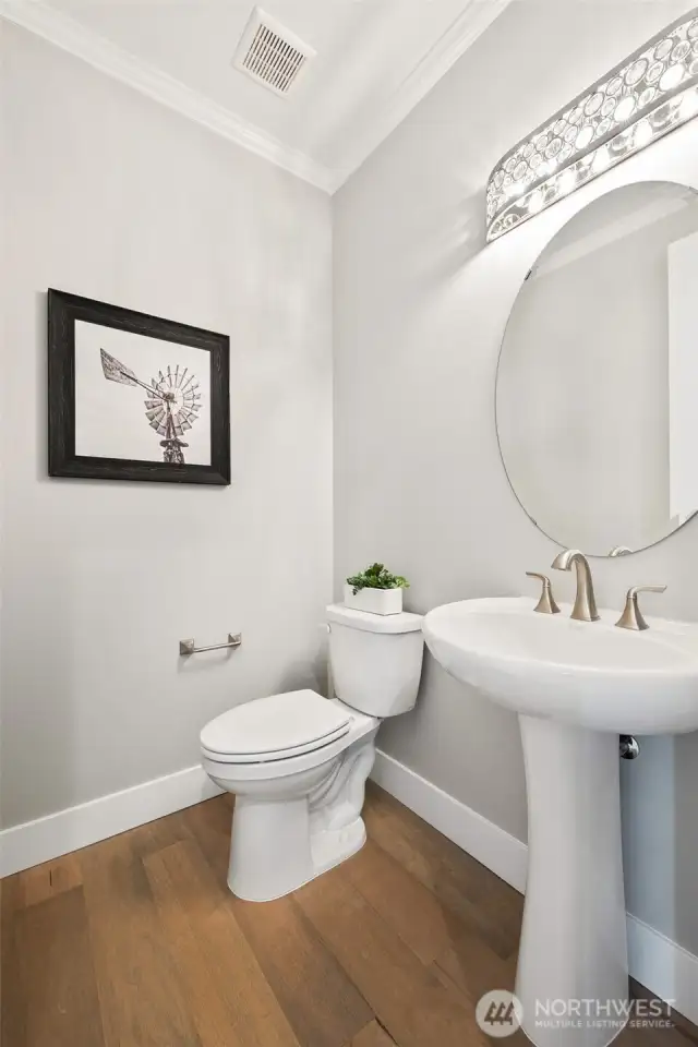 Guest powder room conveniently located near the main living areas.