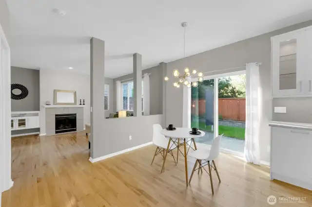 Big eating nook with sliding glass door leads out to the wonderful backyard