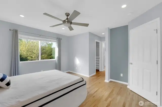 Big primary bedroom with walk-in closet with gorgeous closet organizer & then into the ensuite bath.