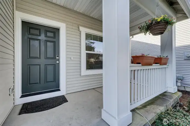 Wonderfully inviting front porch, drip irrigation system for pots & hanging baskets. Front yard is maintained for you by the HOA.
