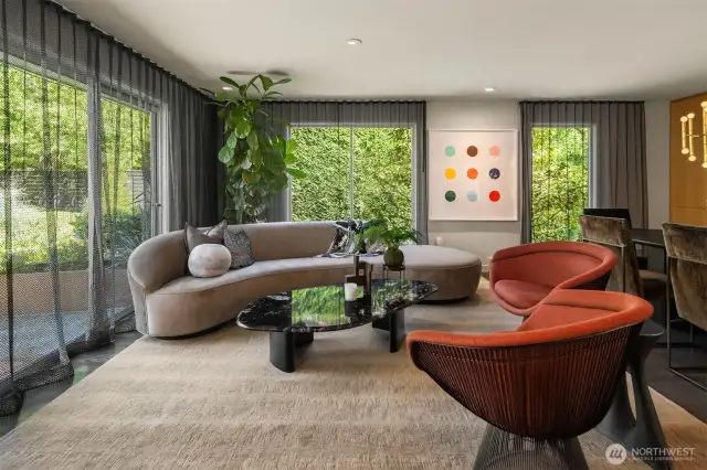 Mature trees and shrubs on all sides deliver exceptional privacy and beauty from every angle.