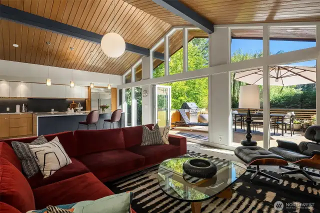 It's hard to imagine a more beautiful and inviting space.  Wood-clad ceilings always lend a special resonance to interiors...light and sound just feel better somehow :)