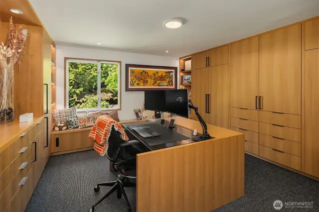 The second bedroom on this floor currently serves as a sumptuous closet/dressing room/office.  The center desk is removable, and there is room for a bed to the right.