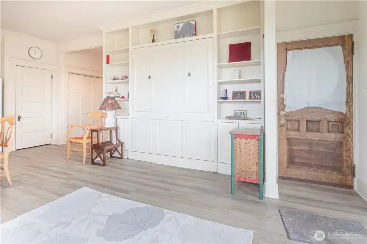 909 Looking at the bookcase wall- Murphy bed is up.