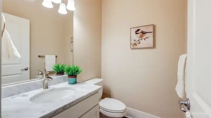 Convenient half bath on the main floor.