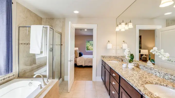 Relax after a long day with a hot bath or in the large walk-in shower.