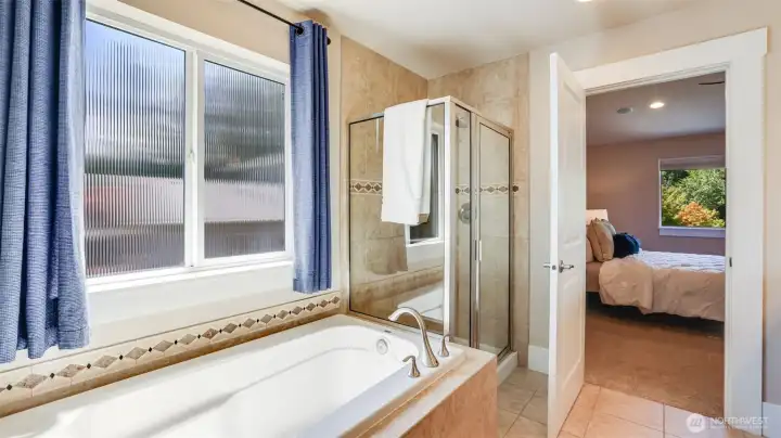 Large window above the tub provides tons of natural light!