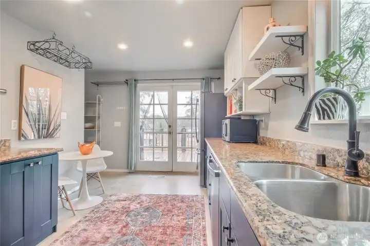 Very spacious kitchen also has beautiful tiled flooring.