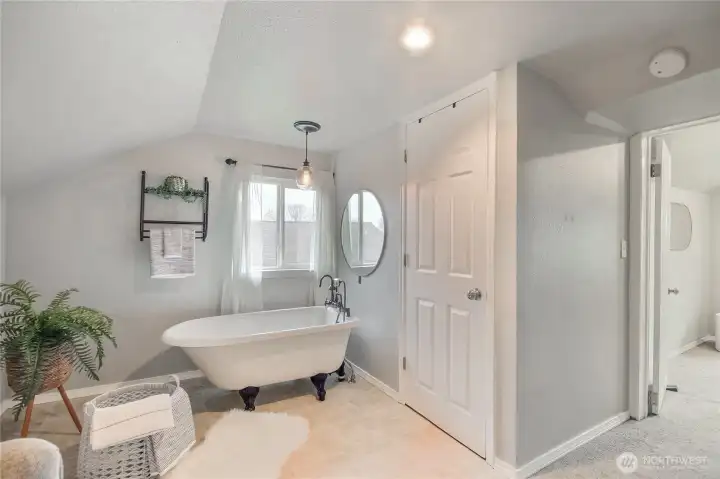 Relax in the charming claw foot tub,complete with a full shower for a modern convenience.