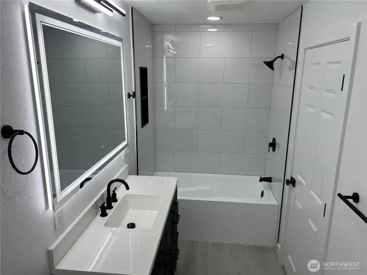 Unit 1 - Fully updated bathroom on main level