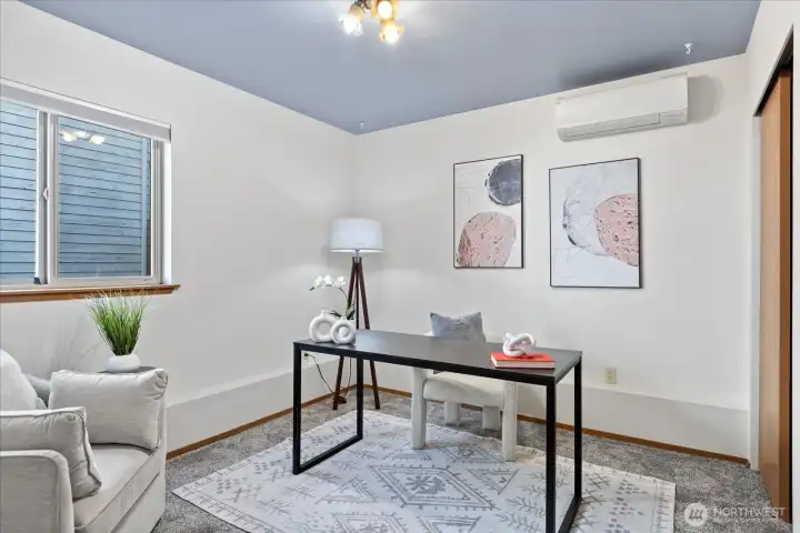Downstairs bedroom #2, with new carpet & mini-split.  Staged as an office.