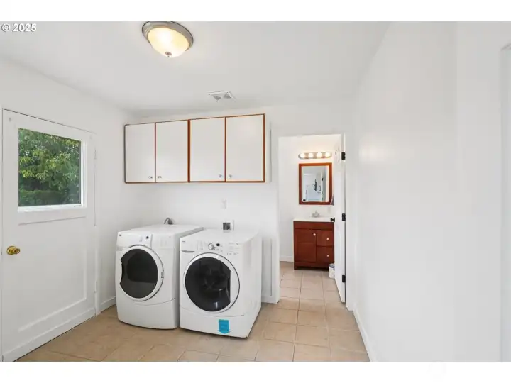 Utility/Laundry Room looking into kitchen-also door to backyard