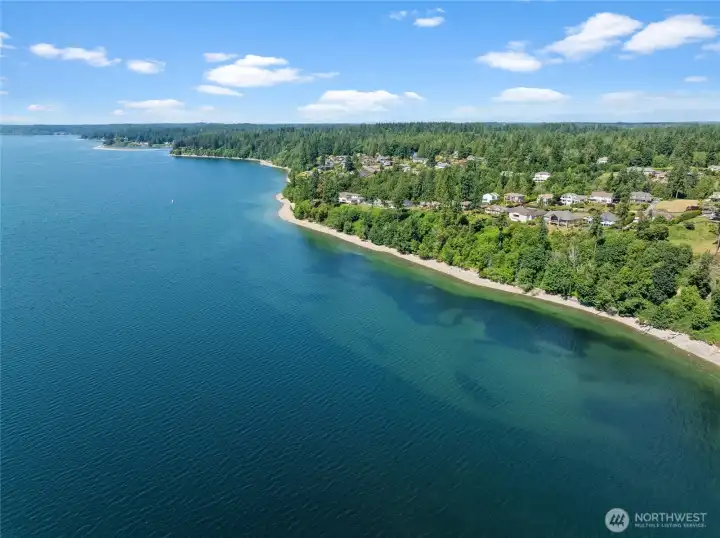 Sun, sand, and a glimpse of the bay. This property has beach trail access through it's own private community!