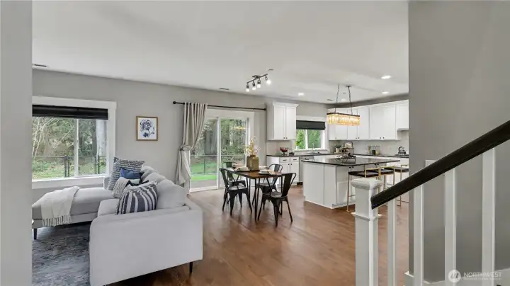 Enjoy seamless flow between the living room, dining space, and beautifully updated kitchen in this light-filled main level.